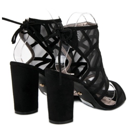 Seastar Sandalias caladas en un post negro 3