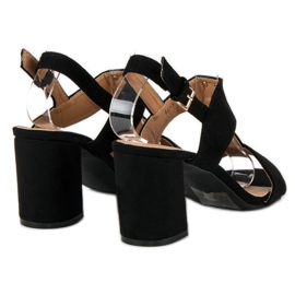 Sandalias de mujer en un poste negro 3