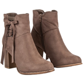 Super Mode Botas beige en el poste 5