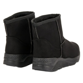 Botas de nieve en la plataforma negro 4