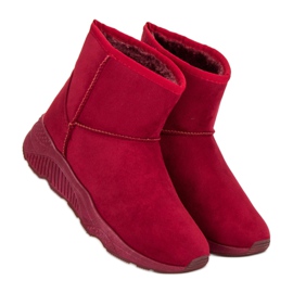 Botas de nieve en la plataforma rojo 1