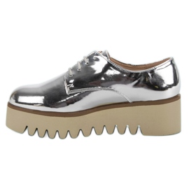 Corina Zapatos plateados con protector gris 4