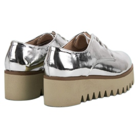 Corina Zapatos plateados con protector gris 5