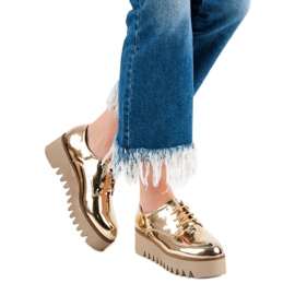 Corina Brogues dorados con protector 1