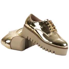 Corina Brogues dorados con protector 4