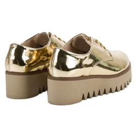 Corina Brogues dorados con protector 6