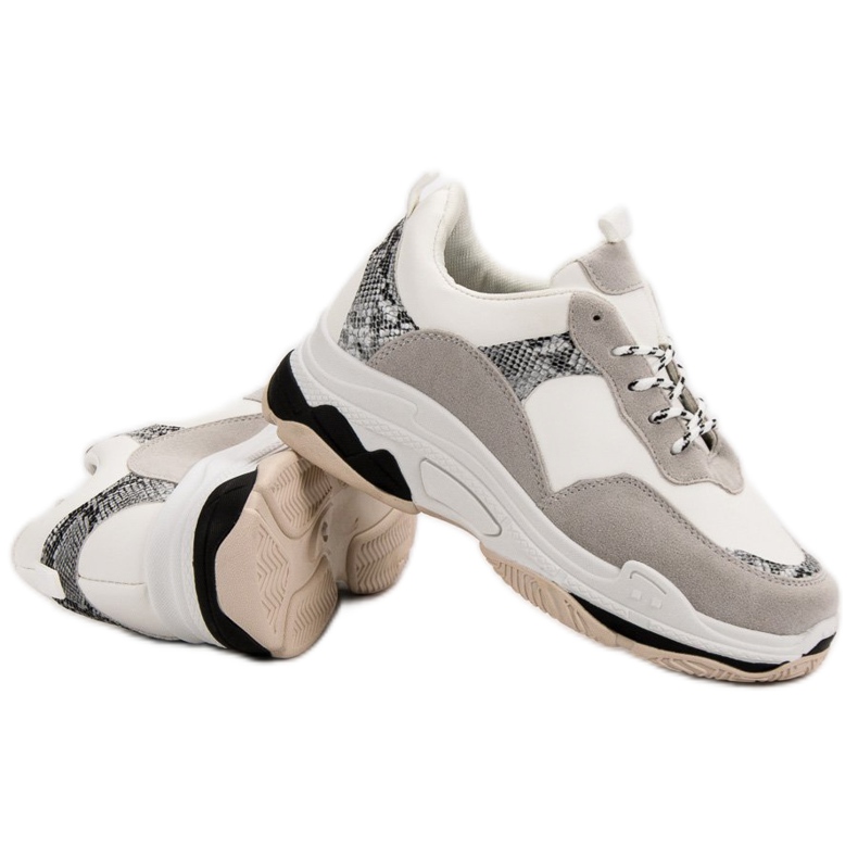 Zapatillas blancas con estampado negro marrón 1 Zapatillas blancas con estampado negro marrón 1