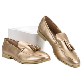 Mocasines dorados con flecos VICES 5