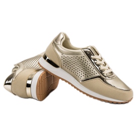 Calzado deportivo dorado 6