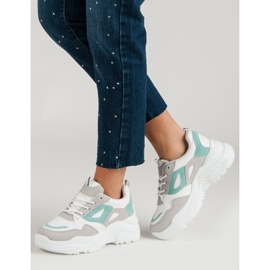 Zapatillas en la plataforma blanco 3