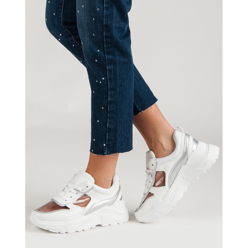 Zapatillas transparentes en la plataforma blanco 1