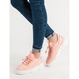 Zapatos deportivos con amor de puño rosa 1