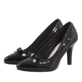 Tacones lacados en negro con cara de Sonia 3