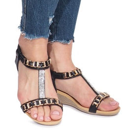 Sandalias negras en un delicado tacón de cuña de árbol negro 2
