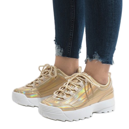 Calzado deportivo dorado de moda 82017 1