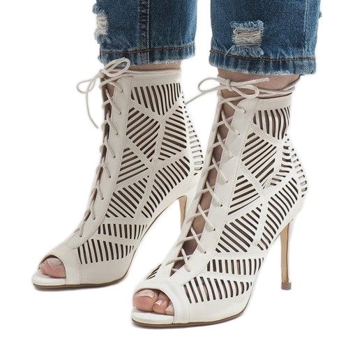 Botas blancas en un pin 1610-225 blanco 1 Botas blancas en un pin 1610-225 blanco 1