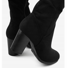 Botas de ante negro en el poste aislado R18-17 4