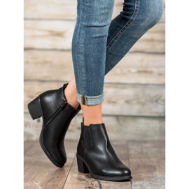 Anesia Paris Botines negros en un poste 2