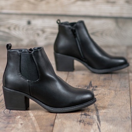 Anesia Paris Botines negros en un poste 3