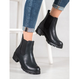Jennika Botas en la plataforma negro 4