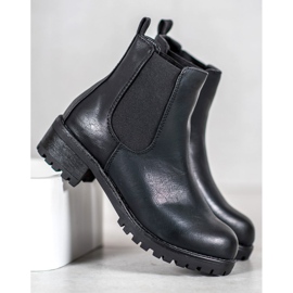 Jennika Botas en la plataforma negro 5
