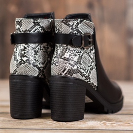Seastar Botas de plataforma con estampado de serpiente negro 4