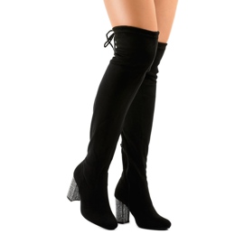 Botas de ante negro en el poste 0-235 3