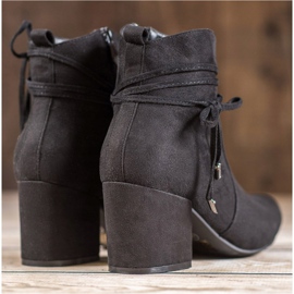 SHELOVET Botas en un poste negro 3