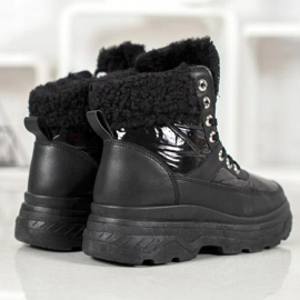 Bella Paris Zapatillas con piel de oveja negro 4