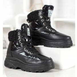 Bella Paris Zapatillas con piel de oveja negro 5