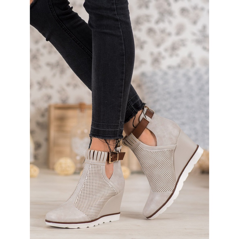 Filippo Botas caladas en una cuña marrón 1