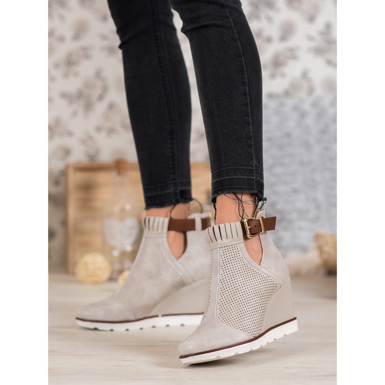 Filippo Botas caladas en una cuña marrón 2