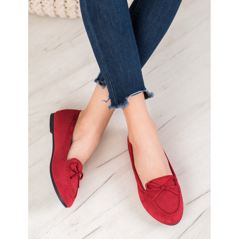 Clowse Señores rojos con un arco 1