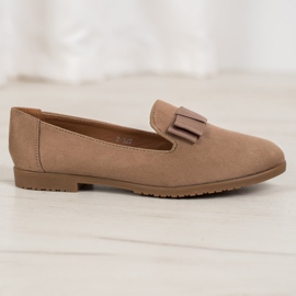 Miss Laura Señores con un arco marrón 2 Miss Laura Señores con un arco marrón 2