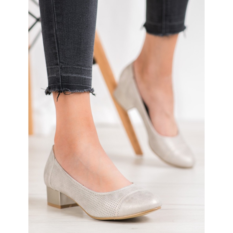 Goodin Bombas caladas sobre un pilar dorado 1 Goodin Bombas caladas sobre un pilar dorado 1