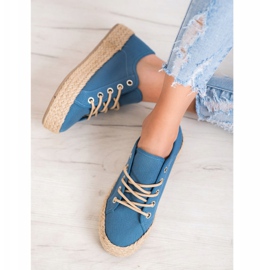 Kylie Zapatillas en una plataforma de paja azul 4