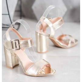 Small Swan Sandalias en una barra con cuero ecológico dorado 1 Small Swan Sandalias en una barra con cuero ecológico dorado 1