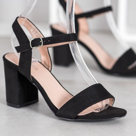 Nio Nio Sandalias en una barra negro 5