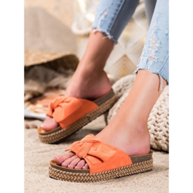 Comer Zapatillas en una plataforma alta naranja 1 Comer Zapatillas en una plataforma alta naranja 1