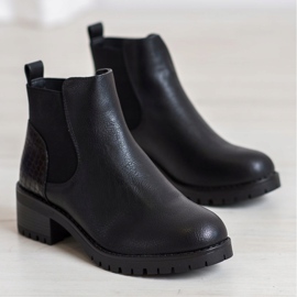 J. Star Botas sin cordones en un poste negro 1