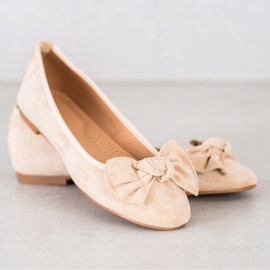 Sixth Sense Bailarina con un lazo beige 3