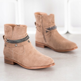 Cm Paris Vaqueras con una cadena decorativa beige 2
