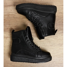 Botas deportivas negras en la plataforma Aethireisis. negro 4