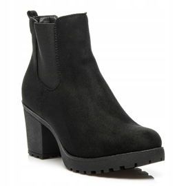 Queentina Botines chelsea en un bar negro 3