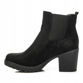 Queentina Botines chelsea en un bar negro 4