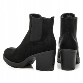 Queentina Botines chelsea en un bar negro 5