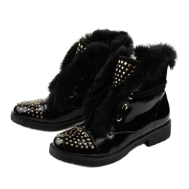 Botas Feminine lacadas planas negras con aislamiento negro 1 Botas Feminine lacadas planas negras con aislamiento negro 1