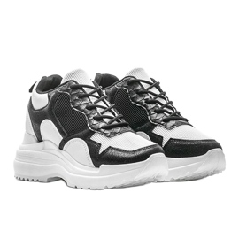 Zapatillas blancas y negras en la cuña Alexandra blanco negro 1