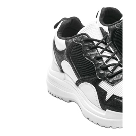 Zapatillas blancas y negras en la cuña Alexandra blanco negro 3