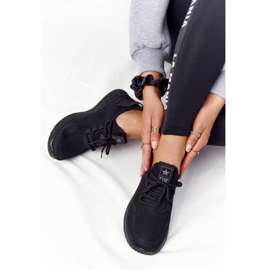 Zapatos deportivos negros slip-on femeninos 2 Zapatos deportivos negros slip-on femeninos 2